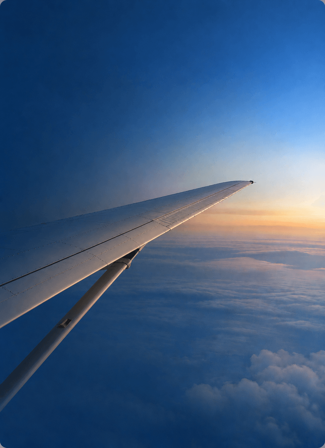 Aircraft wing at sunset
